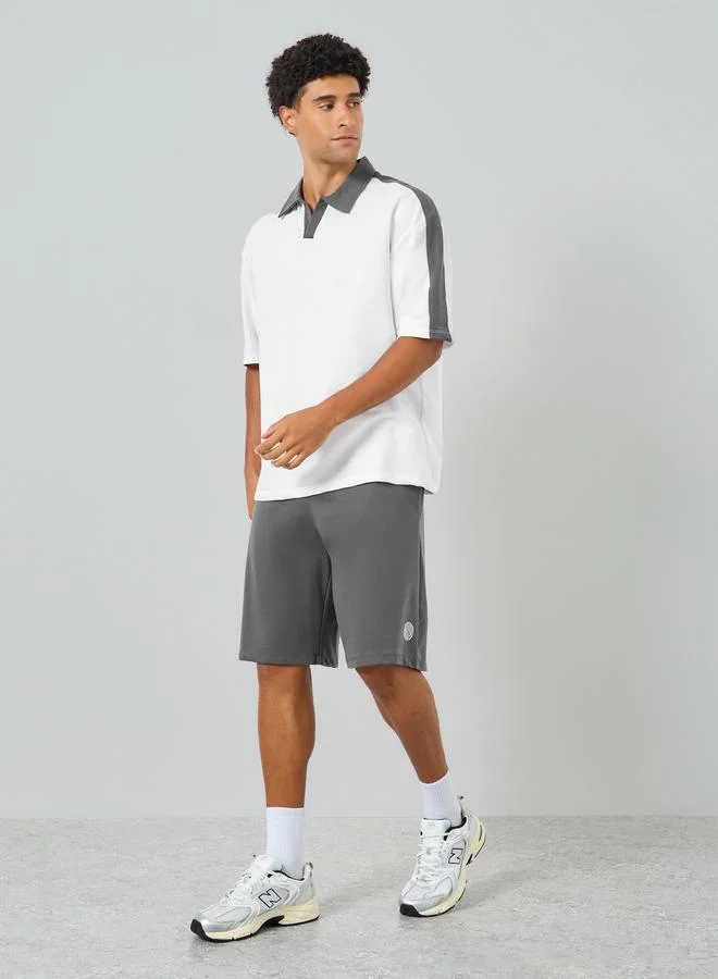 Styli  Men White Oversized Polo and Shorts Co-Ords for Men | Best Price UAE